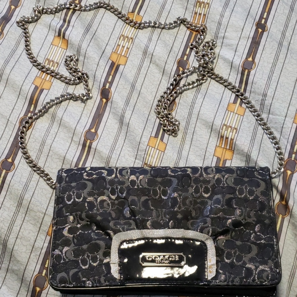Black and silver Coach crossbody bag